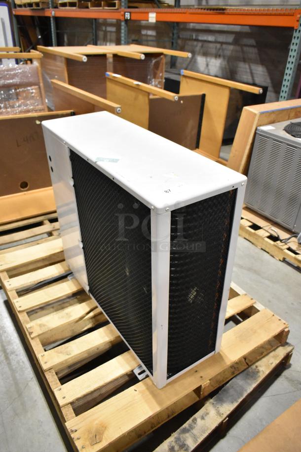 Samsung UD26A1C2 metal air conditioner, 208-230V, 1 phase, 12,500-13,500 BTU, shown on a pallet. Moderate condition.