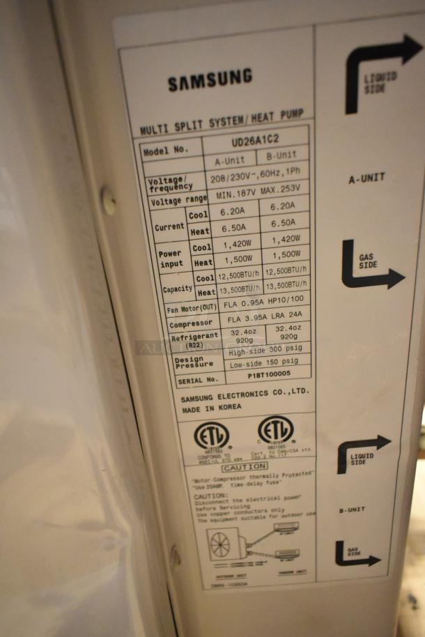 Samsung UD26A1C2 air conditioner label; 208-230V, 1 phase, 12,500-13,500 BTU, metal build. Made in Korea.