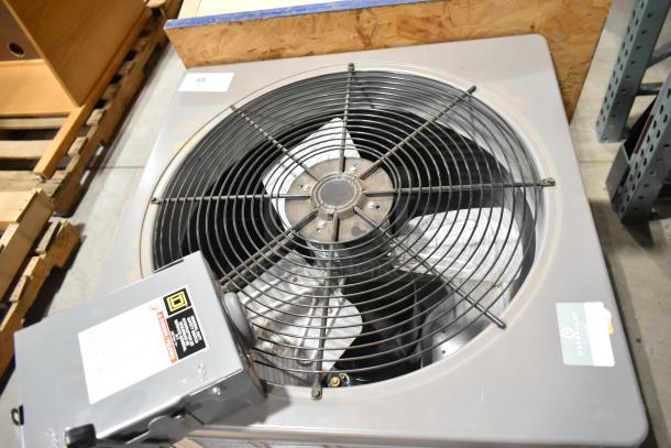 Rheem 13PJA24A01 air conditioner condenser, metal build, 208/230 volts, 1 phase. Features top fan and control box.