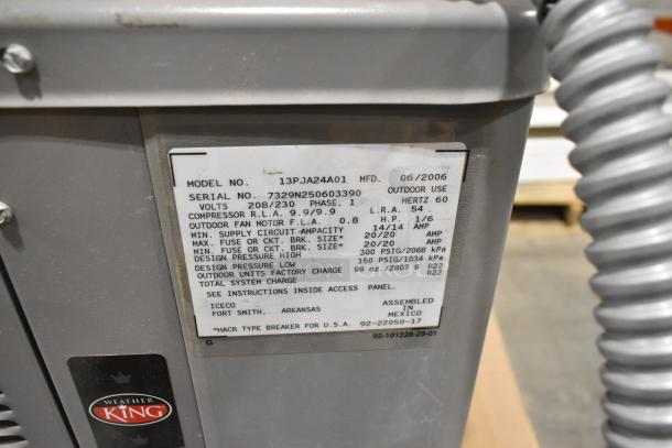 Rheem 13PJA24A01 air conditioner condenser, 208/230V, 1 phase. Serial No. 7329N250603390, manufactured 06/2006.