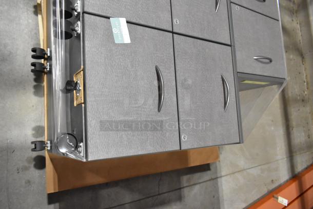 4 gray, two-drawer filing cabinets on casters, featuring sleek handles and visible OverNite label; in excellent condition.