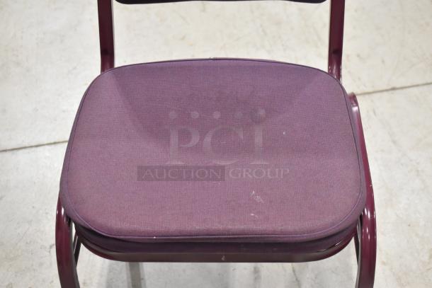 Maroon metal chair with matching upholstered seat and backrest, shown in used condition, ideal for bulk purchase.