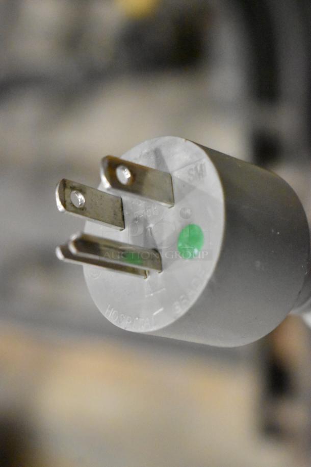 Hospital-grade power plug with three prongs and green indicator, part of EP MedSystems ViewMate II Ultrasound System.
