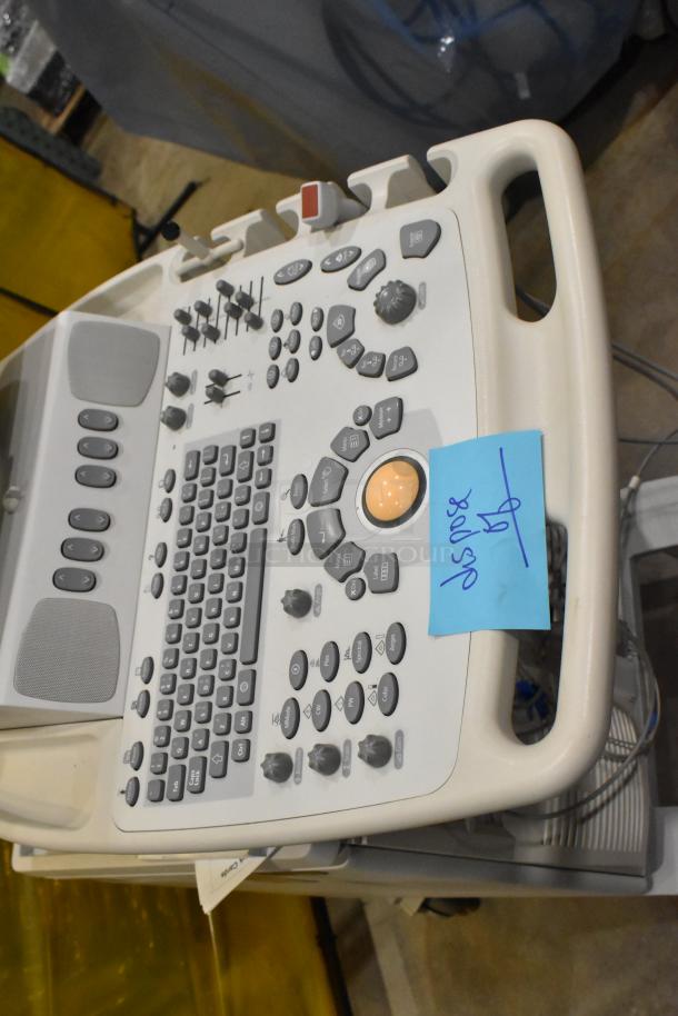 Philips M2540A Ultrasound System on casters, showing control panel with various buttons and dials. Condition appears used.