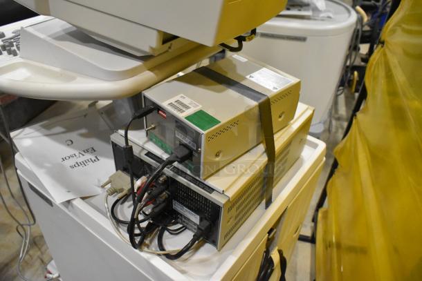 Philips M2540A Ultrasound System on casters, featuring a control panel and multiple connections; slight wear visible.