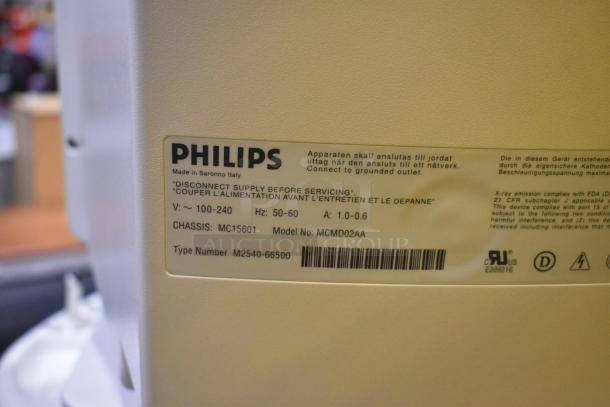Philips M2540A Ultrasound System chassis label showing model MCMD02AA, voltage 100-240V, type number M2540-66500.