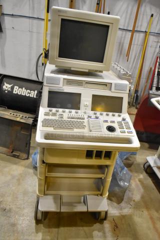 Hewlett Packard HP Ultrasound System on casters, featuring control panel, monitor, storage shelves; used condition.