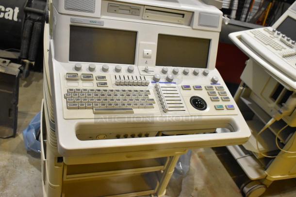 Hewlett Packard HP Ultrasound System on casters, dual screens, control panel, and operational buttons. Good condition.