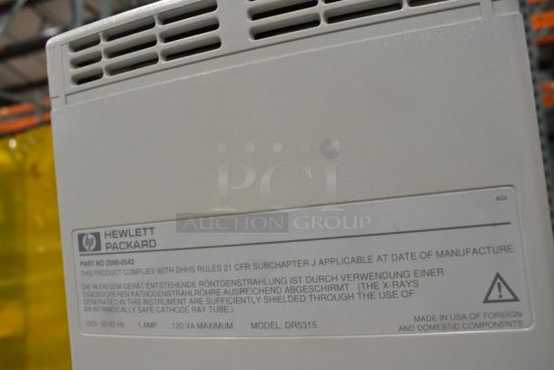 Hewlett Packard HP Ultrasound System, model DR5315, on casters. Label shows compliance and manufacturing details.