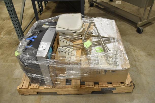 Pallet lot with Bionet CardioTouch-3000 ECG and GE MAC1200 EKG, various medical items, wrapped for auction.