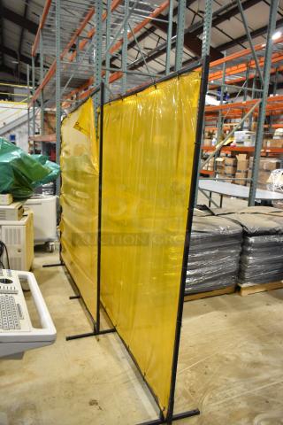 Two yellow Steiner Industries screens in metal frames, excellent condition, ideal for industrial use.