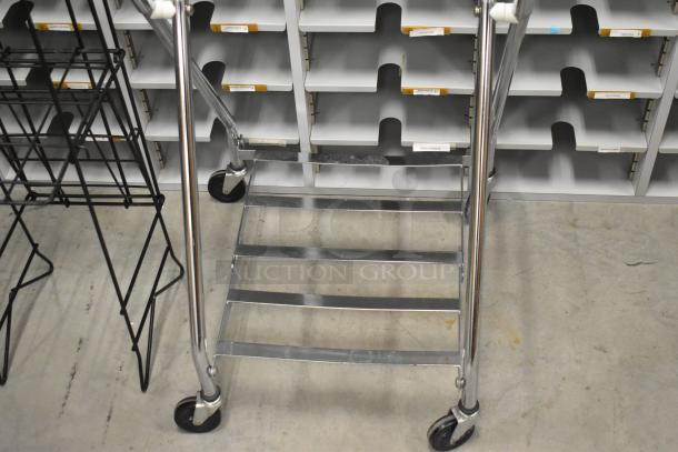 Laundry bag frame on casters and wire newspaper stand, metal construction, good condition, dual purchase opportunity.