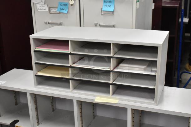 2 countertop multi cubby mailboxes, each with 12 compartments, white finish, good condition, ideal for office organization.