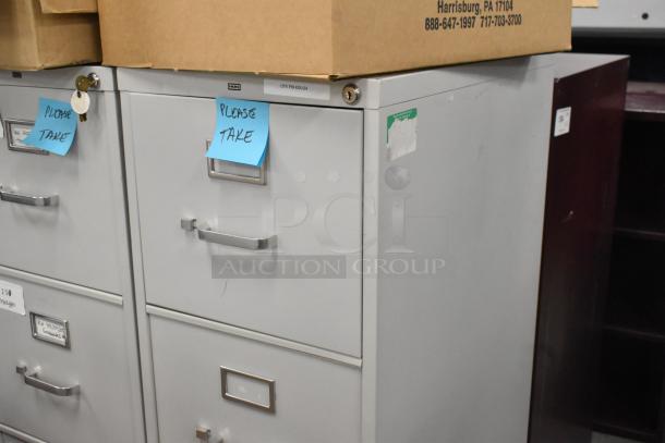 Two gray metal four-drawer filing cabinets in good condition, with "Please Take" notes attached.