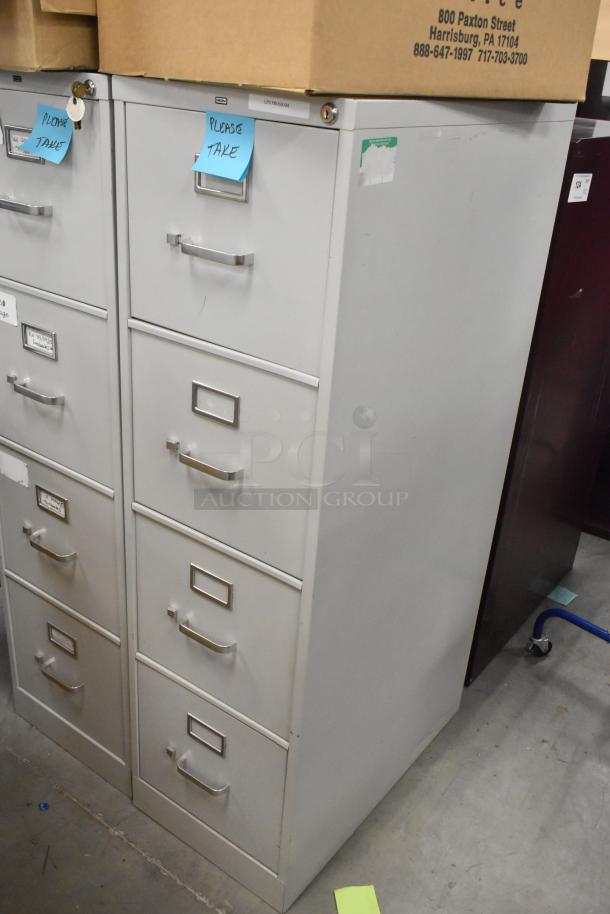 Two gray metal 4-drawer filing cabinets, each with pull handles and label slots. Condition: used. Sticky notes say "Please Take."