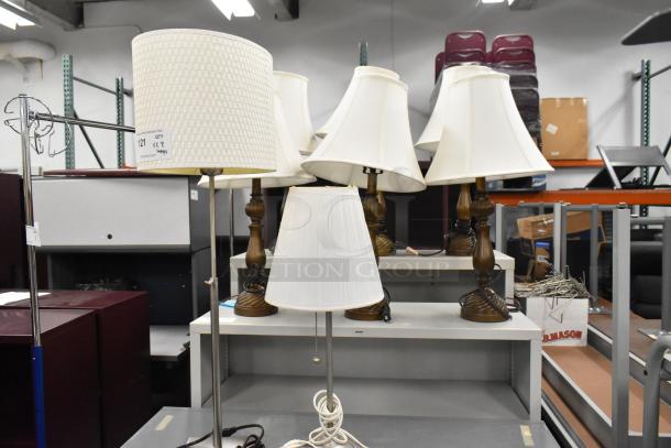 Eight assorted lamps, includes modern and classic styles, beige and white shades, varying conditions, some minor wear.