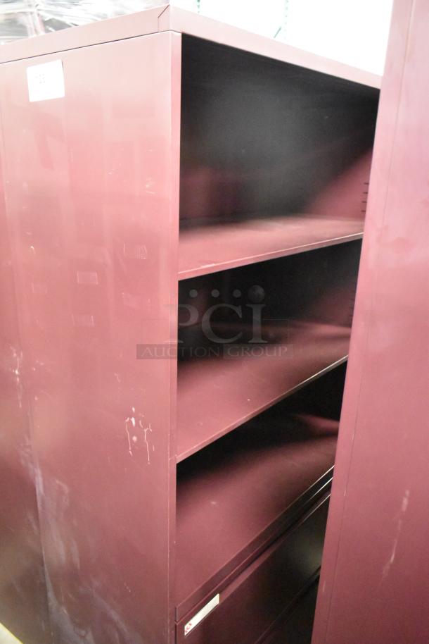 Maroon metal book shelf with four shelves, slight wear, durable construction, ideal for office or home storage.