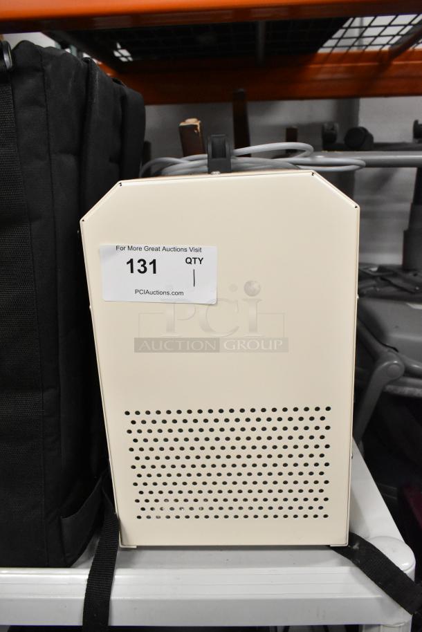 Hitec DSS 110-2 Air Compressor, 120V, 1 Phase, cream color, vented side panel, auction label "131 QTY" visible.