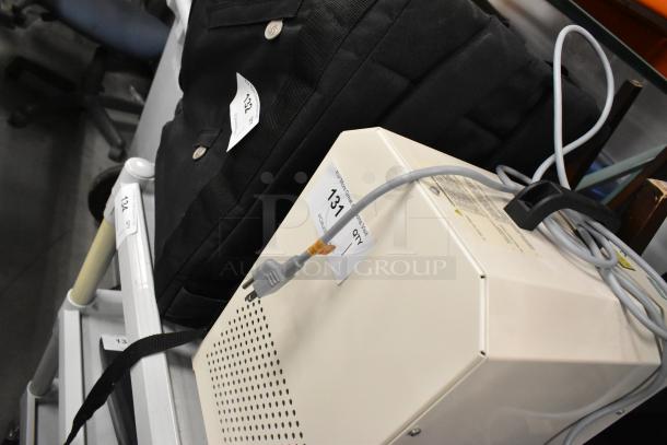 Hitec DSS 110-2 Air Compressor, 120V, 1 Phase, with power cord. Auction tag 131 visible. Good condition.