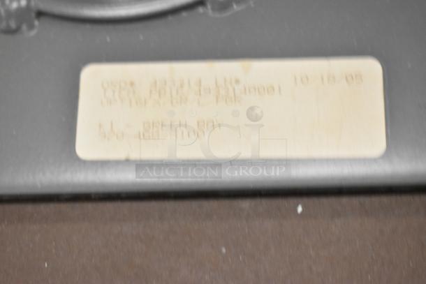 10 gray tables with blurred label, indicating details related to the tables. Condition not specified.