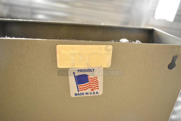 Buddy Products tan metal time card holder, features "Proudly Made in U.S.A." label, sturdy construction, good condition.