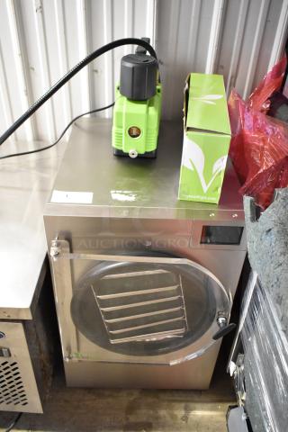 Harvest Right HRFDL Stainless Steel Home Pro Freeze Dryer, 115 Volts, 1 Phase, with attached pump, appears in good condition.