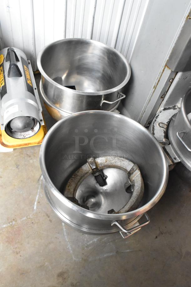 Hobart M-802 80-quart dough mixer with bowls, paddle, whisk, and bowl dolly. Metal construction, commercial grade condition.