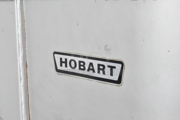 Hobart M-802 metal commercial mixer, 80 qt, with three bowls, bowl guard, dolly, paddle, and whisk. 200V, 3-phase.