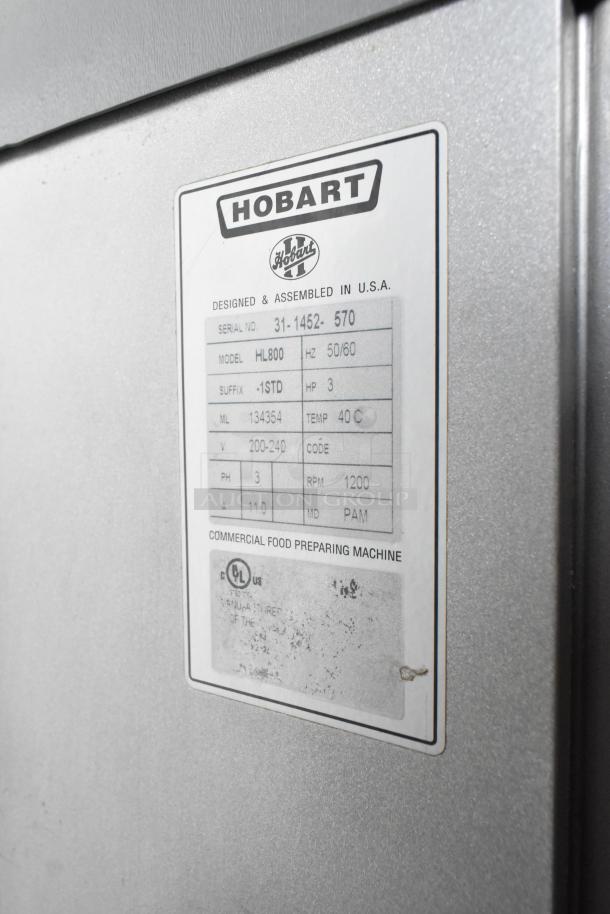 Hobart HL800 commercial dough mixer label showing model, serial, power details. 80-quart capacity, 3-phase, 200-240V.