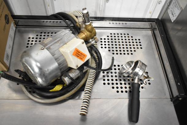 La Marzocco 3 Group Espresso Machine, stainless steel, includes portafilters and steam wands, 220-240V. Good condition.