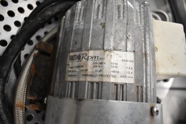 La Marzocco Firenze 3 Group Espresso Machine motor, showing a label with 220-240 V, 1/5 HP, thermally protected.