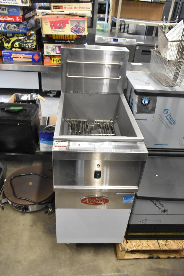 Brand new 2024 Avantco 177EF40B stainless steel 40 lb. electric fryer with two metal baskets; features logo and warning label.