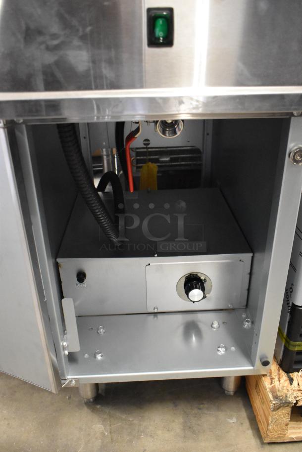 Brand new Avantco 177EF40B 40 lb. stainless steel electric fryer, scratch and dent, 208V, 1 phase, with 2 metal fry baskets.