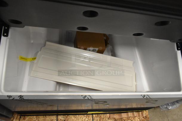 Hoshizaki KM-301BAJ stainless steel undercounter ice machine interior, new condition, includes bin, 290 lb capacity.