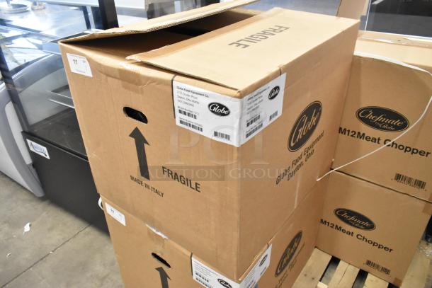 Boxed Globe G12 stainless steel commercial meat slicer. New scratch and dent. Fragile marking, made in Italy.