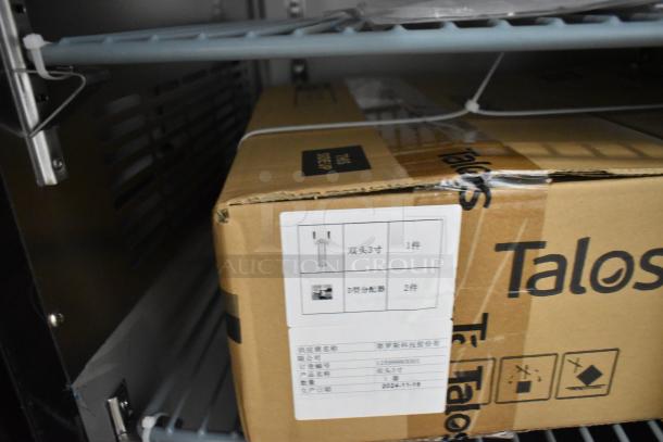 Brand new Avantco 178UDD72HC kegerator in packaging, scratch and dent condition, with visible installation instructions and labels.