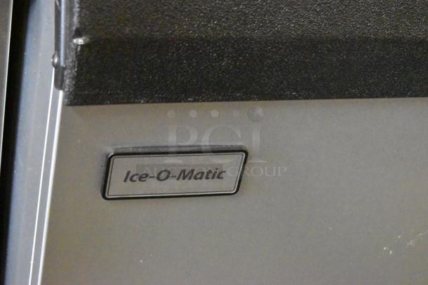 2022 Ice-O-Matic CIM1446HW6 stainless steel ice machine on bin, 48", 1520 lb capacity, 208-230V, 1 phase, logo shown.