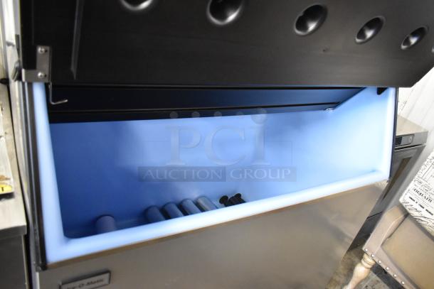 2022 Ice-O-Matic CIM1446HW6 stainless steel ice machine on bin, 48" wide, commercial-grade, 1520 lb capacity.