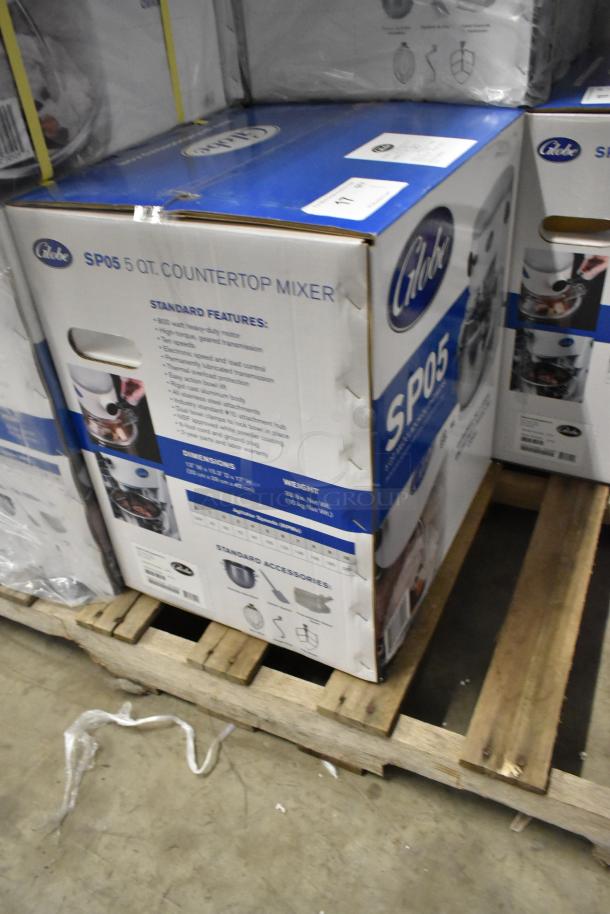 Boxed Globe SP05 5 Quart Metal Countertop Planetary Dough Mixer; 115V, 1 Phase, new with slight packaging dents.