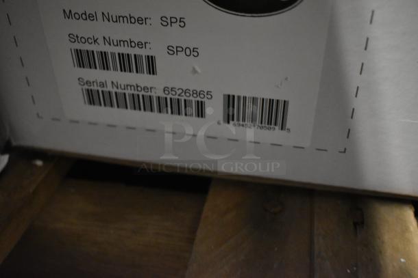 BRAND NEW Globe SP05 5 Quart Planetary Dough Mixer, metal, 115V, label shows model SP5, serial 6526865. Scratch and dent condition.