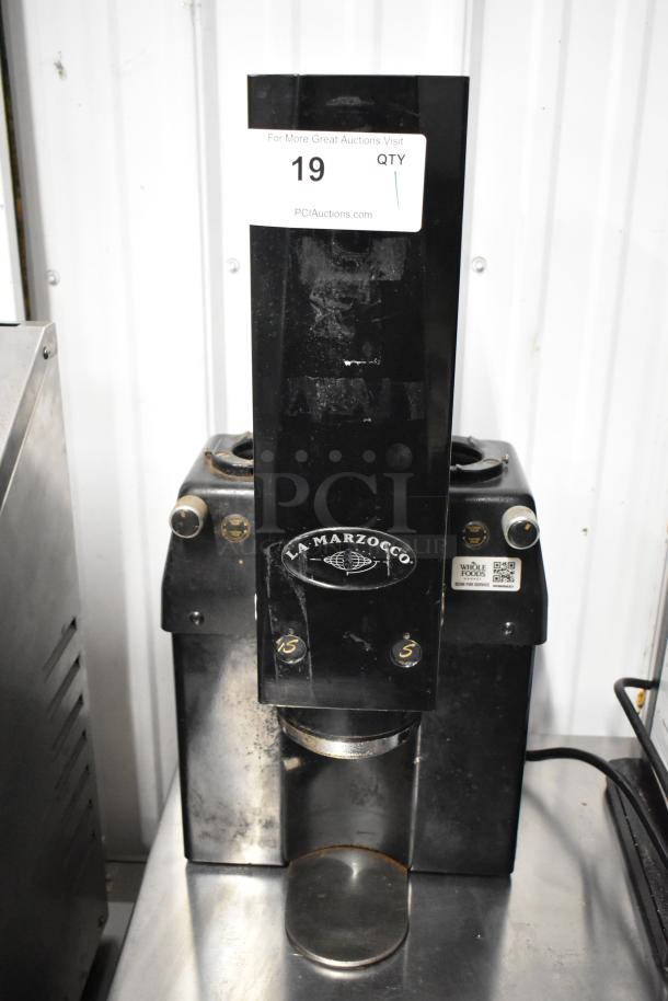 La Marzocco Swift E.P.S.B. commercial espresso bean grinder, metal, missing hoppers, 120V, 1 phase. Signs of wear.