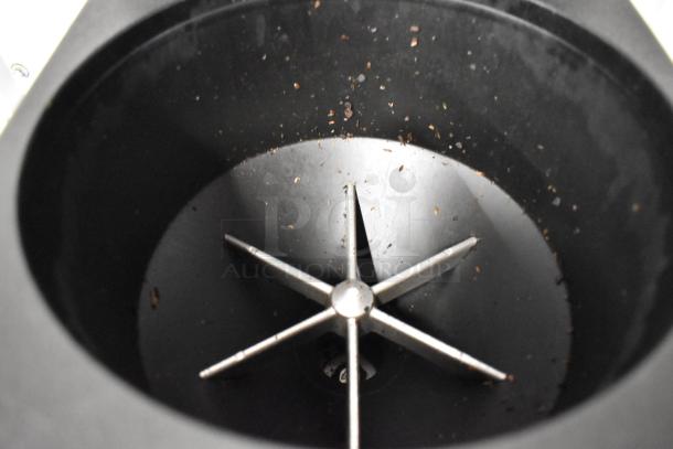 Mahlkonig Ditting KR1203 coffee grinder interior detail, showing metal blades. Used condition, suitable for commercial use.