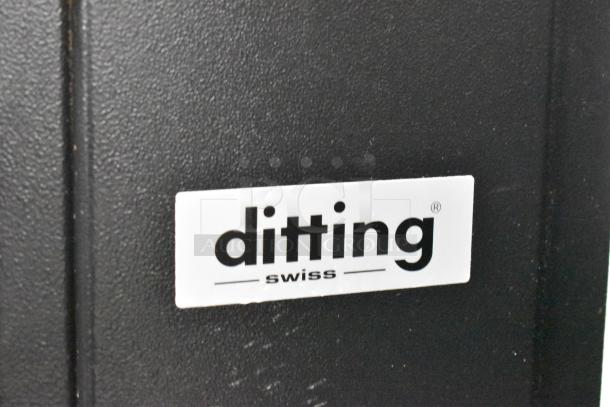 Mahlkonig Ditting KR1203 metal commercial coffee grinder, featuring a "ditting swiss" label, 120 volts, 1 phase.