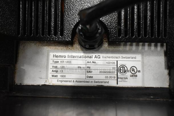 Mahlkonig Ditting KR1203 commercial coffee grinder label, showing model, 120 volts, 60 Hz, 13 amps, 1600 watts, SN# 2036028022.