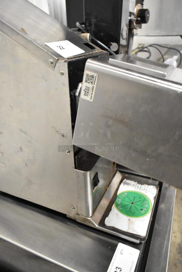 Cornelius NG2000 metal nut butter grinder, commercial countertop model, visible wear, 120 volts, 1 phase, with QR code label.