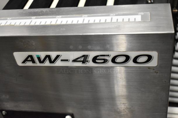 Hobart AW-4600 commercial heat shrink wrap station, metal, floor style, minor wear, model tag visible.