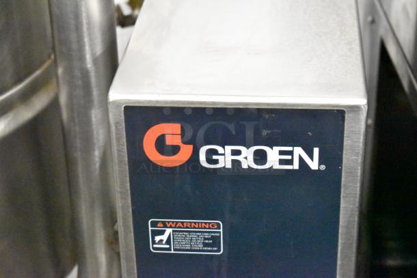 Groen TDB-40 stainless steel commercial 10-gallon steam kettle, 208 volts, 1 phase, on casters with warning label visible.
