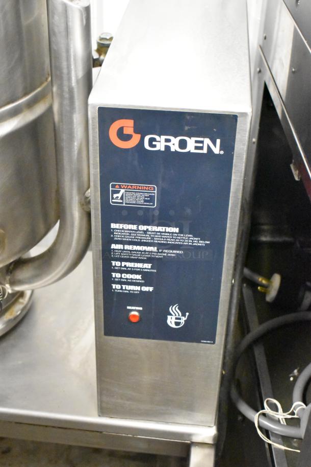 Groen TDB-40 stainless steel 10-gallon steam kettle on casters, 208V, 1 phase. Features operation instructions and warning label.