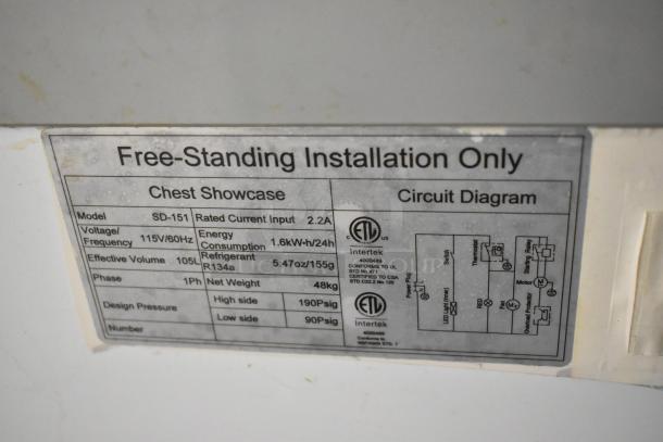 SD-151 Metal Commercial Chest Freezer, 115V, 1 Phase. Features 105L volume, R134a refrigerant, on commercial casters. Model label shown.