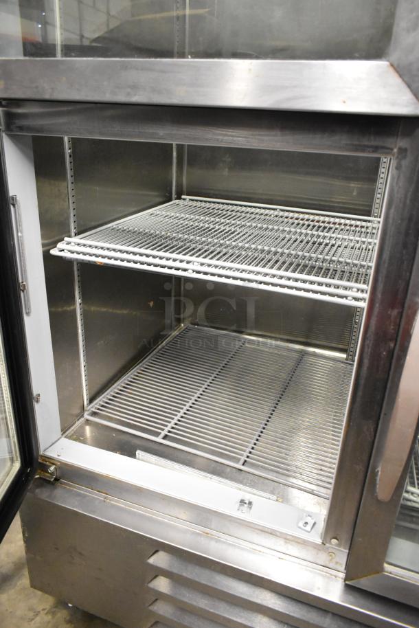 Beverage Air HBR49HC-1-HG stainless steel commercial cooler with 4 half-size doors, poly coated racks, and commercial casters.